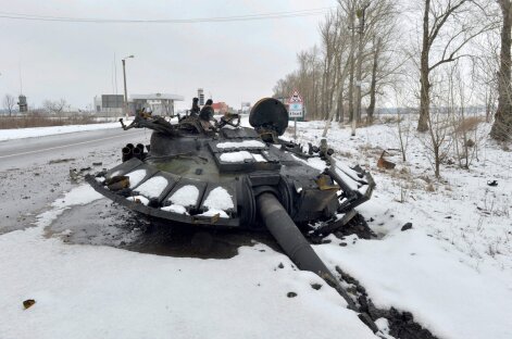 destroyed Russian tank is seen on the roadside on the outskirts of Kharkiv on February 26, 2022
