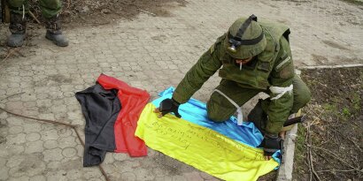 Flags of Ukraine and the "Right Sector"* found in near Mariupol