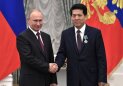 Vladimir Putin and Li Hui, photo - Wikipedia